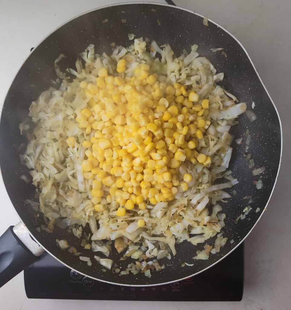 adding sweet corn