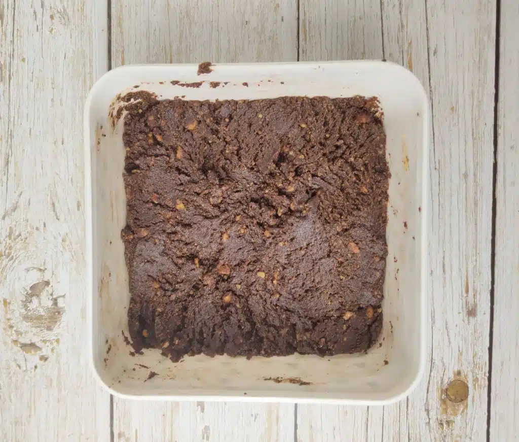 preparing crust for blueberry chocolate cake