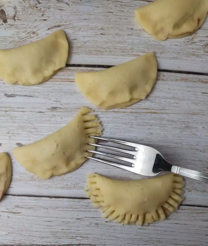 assembling empanada cookies