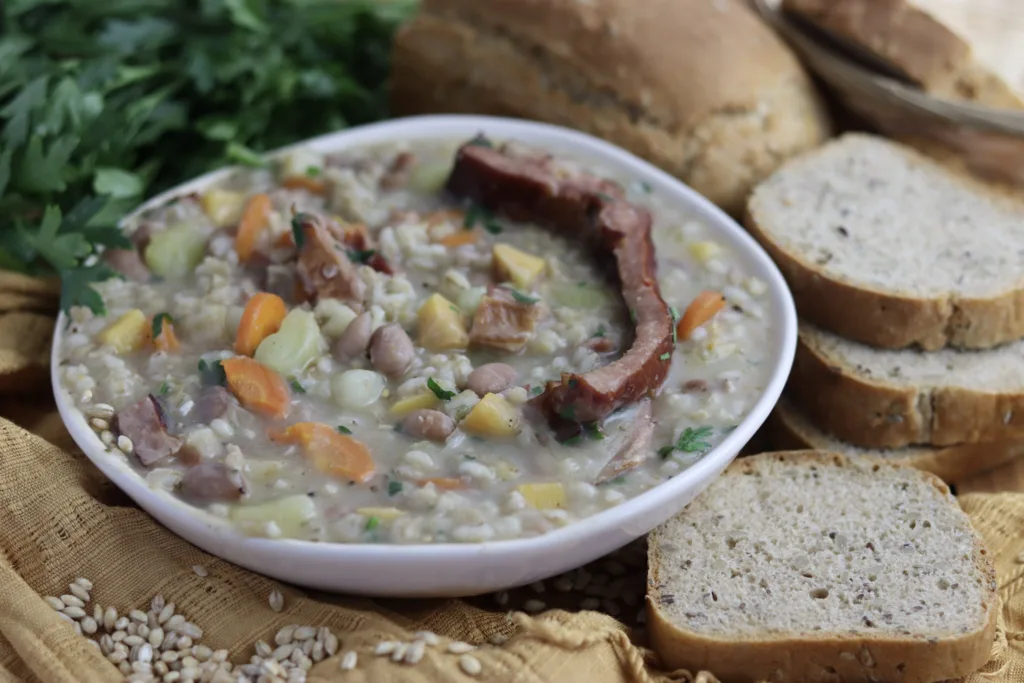 image of ricet on a plate with fresh parsley and warm bread