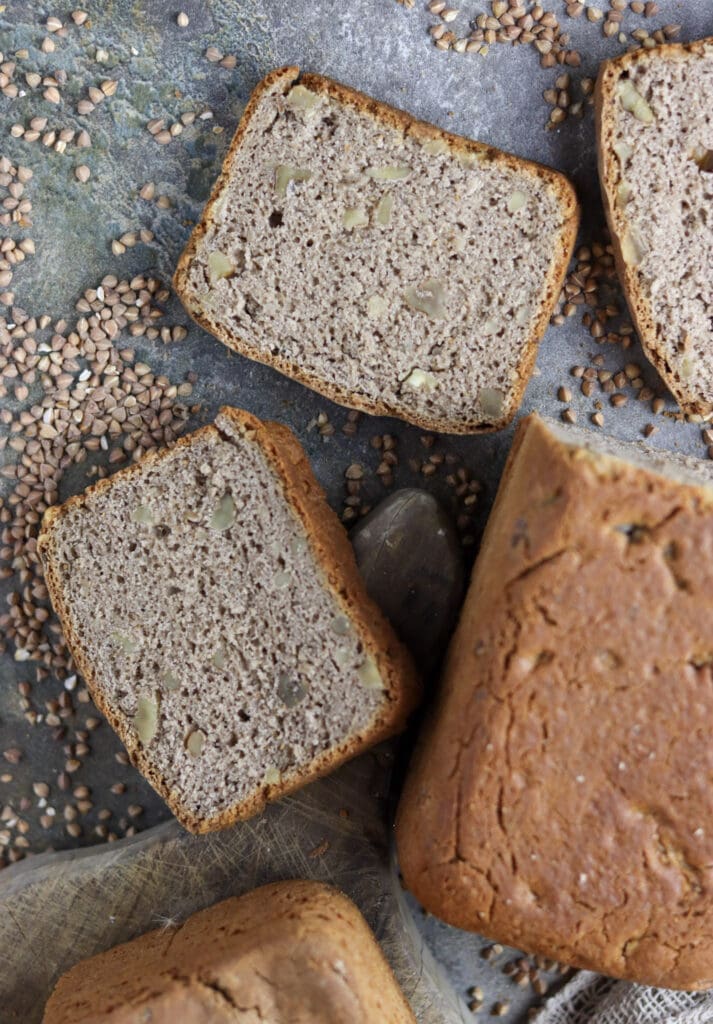 pieces of baked buckwheat bread with walnuts on the table