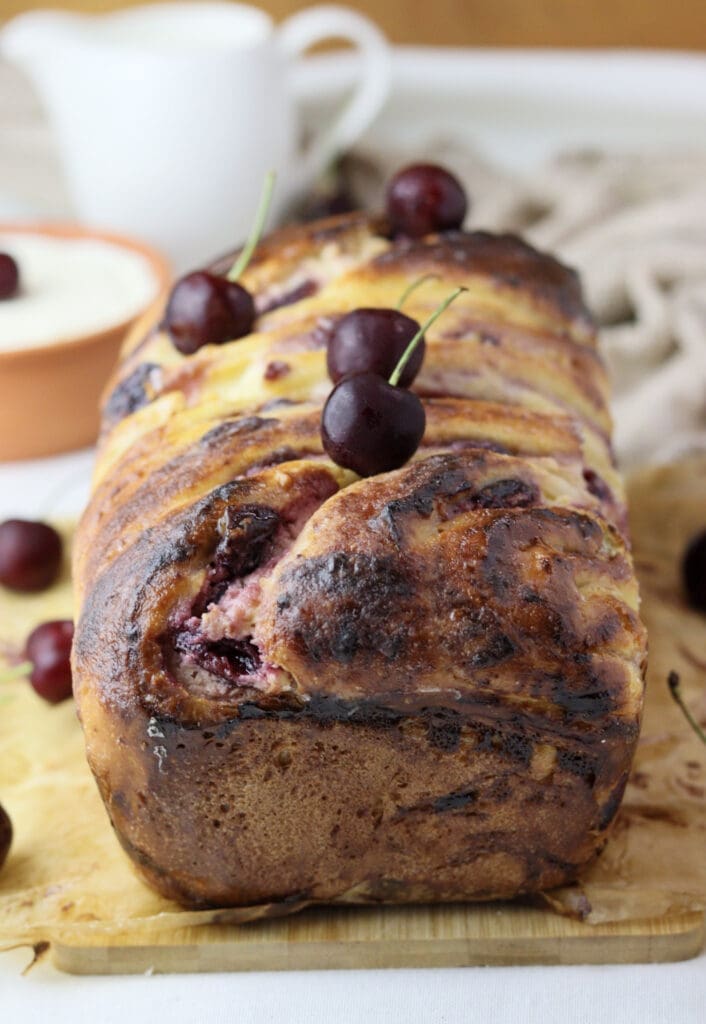 image of baked cherry cheese babka loaf 