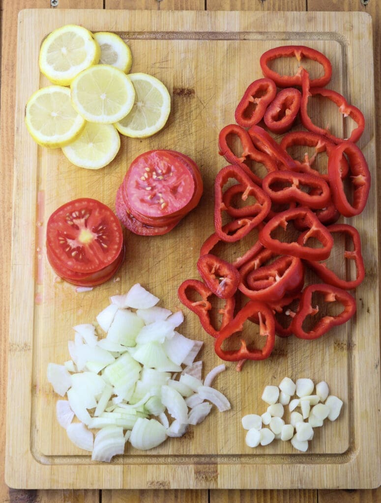 image showing how to slice the vegetables and crush the garlic 