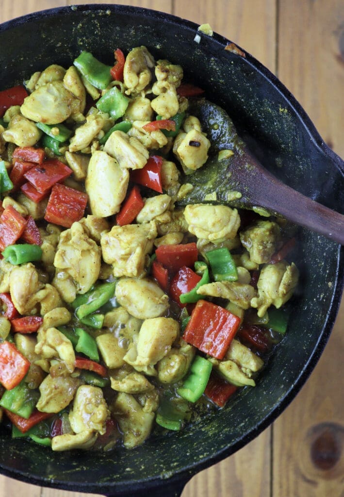 Image showing chicken with bell peppers before they are added to curry rice 