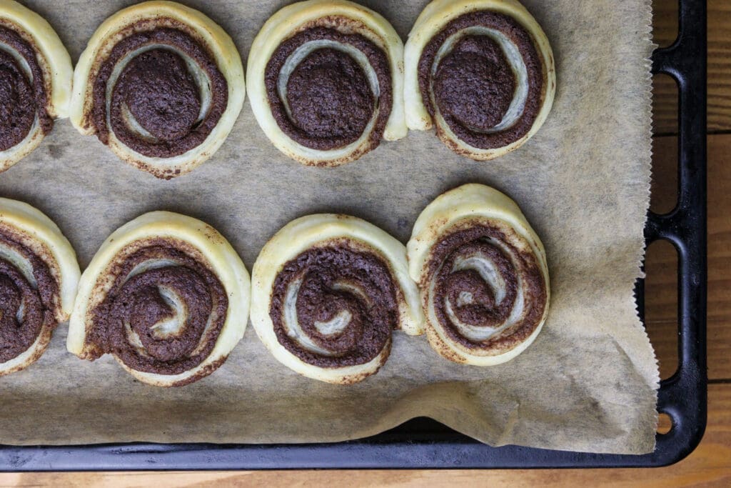 image showing freshly baked cinnamon puff pastry pinwheels 