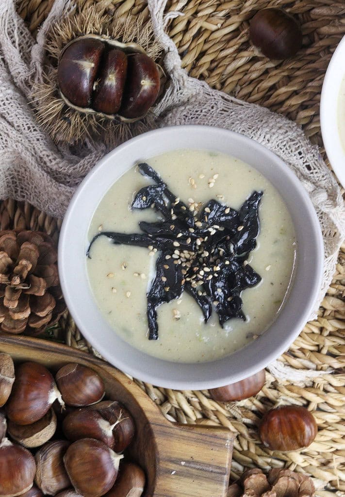 pear and potato soup served with fall decoration in the background 