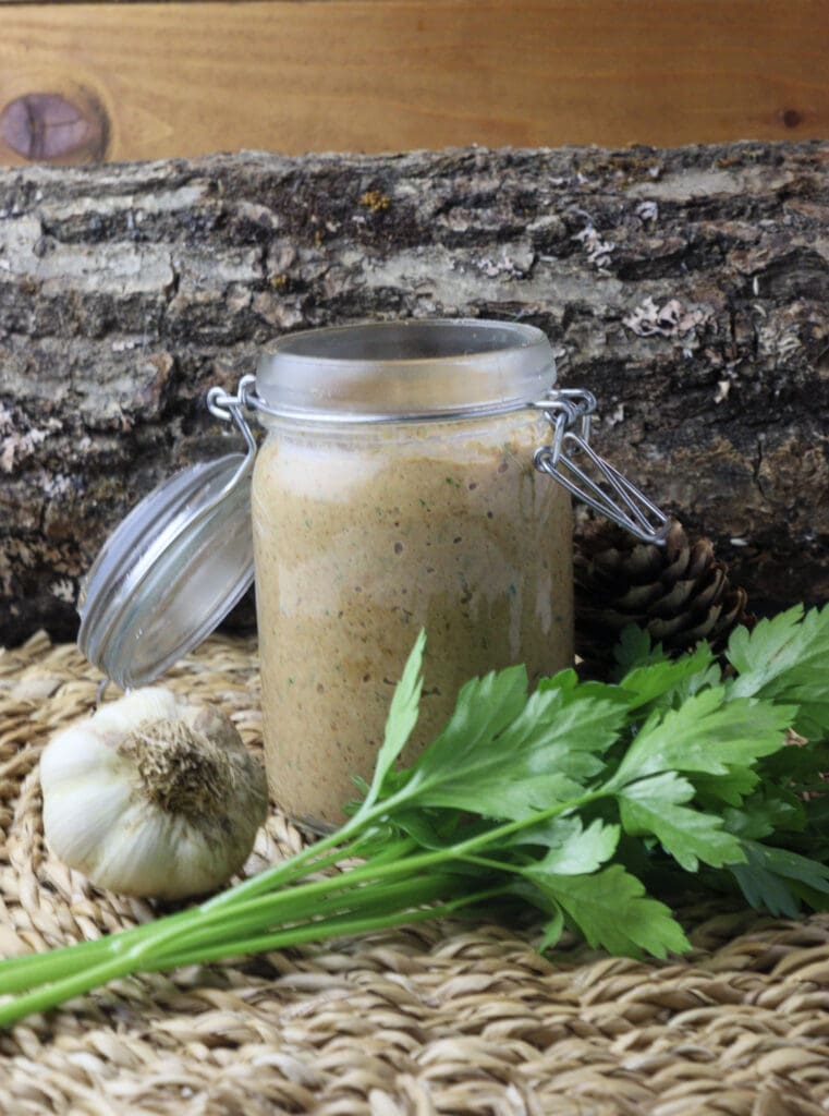 image of fresh, warm saffron milk cap pate in a glass jar