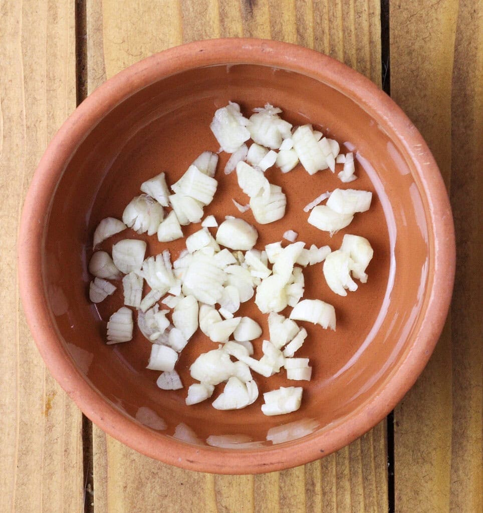 sliced garlic in a small bowl