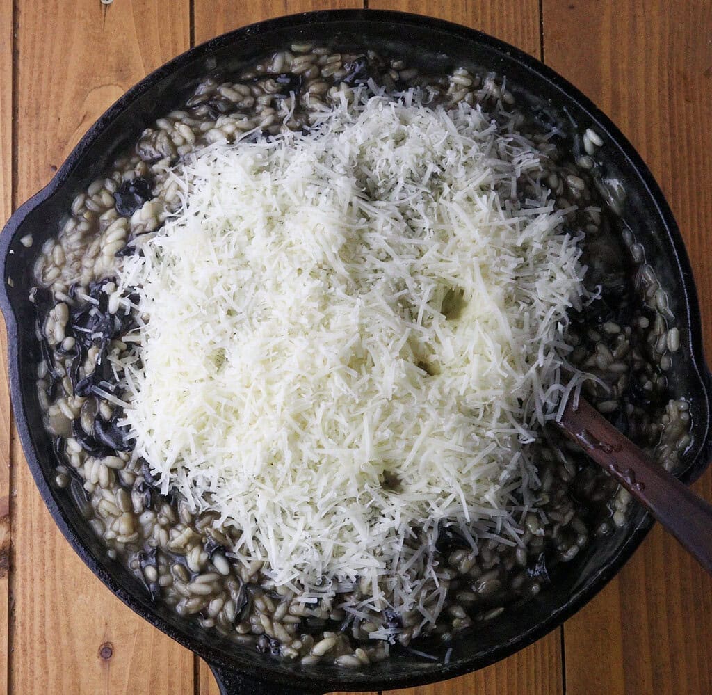 image showing how to add parmesan cheese to risotto when it's cooked