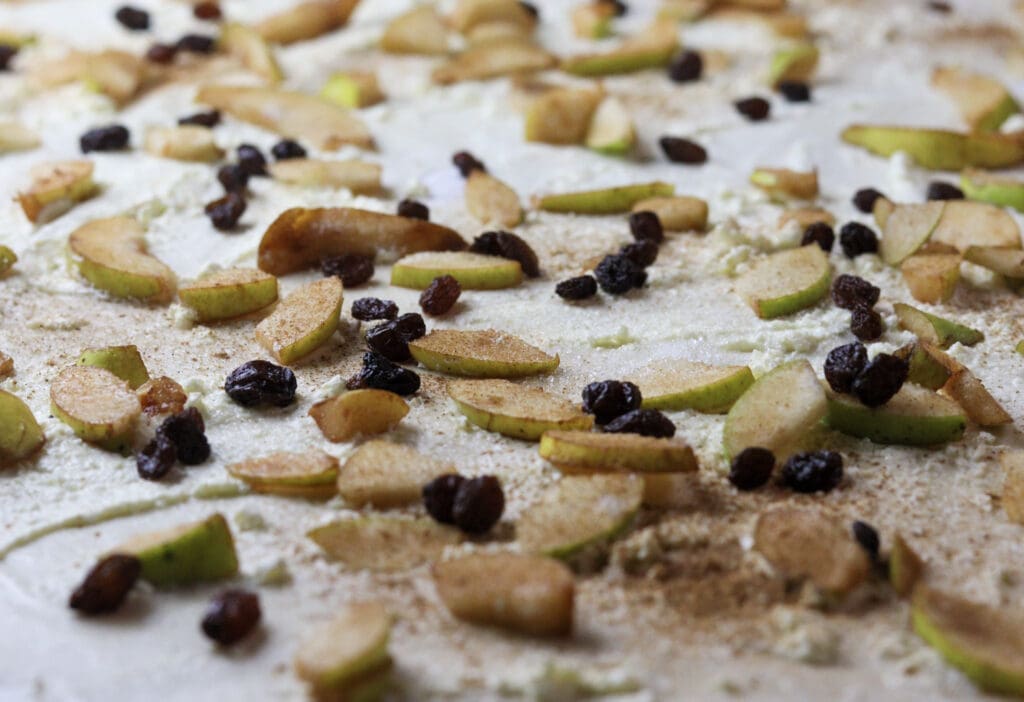 image showing how to add the raisins to the dough