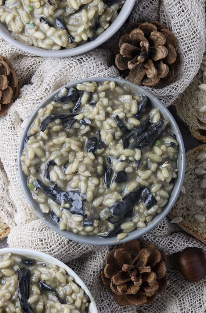 cooked and served bowls of black trumpet risotto