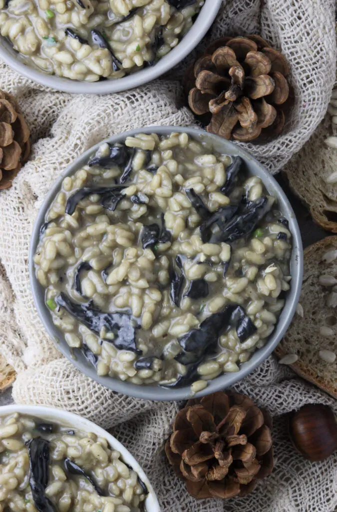 cooked and served bowls of black trumpet risotto
