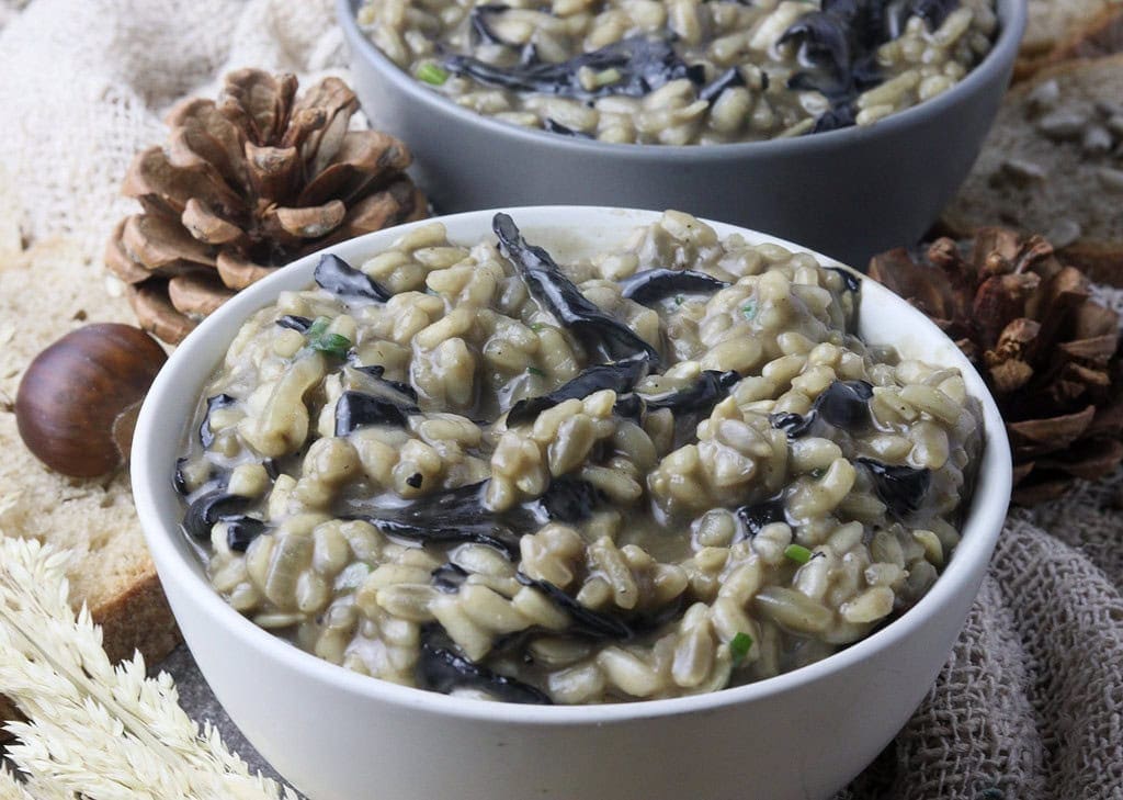 image of two black trumpet risotto bowls