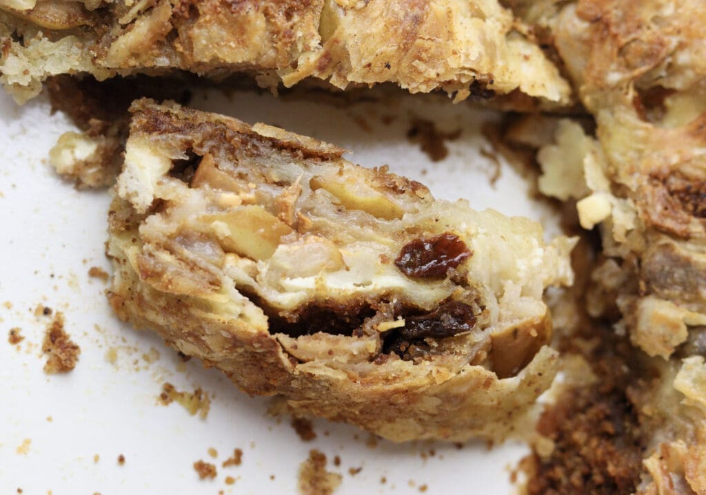 image showing a piece of delicious pear cheese strudel