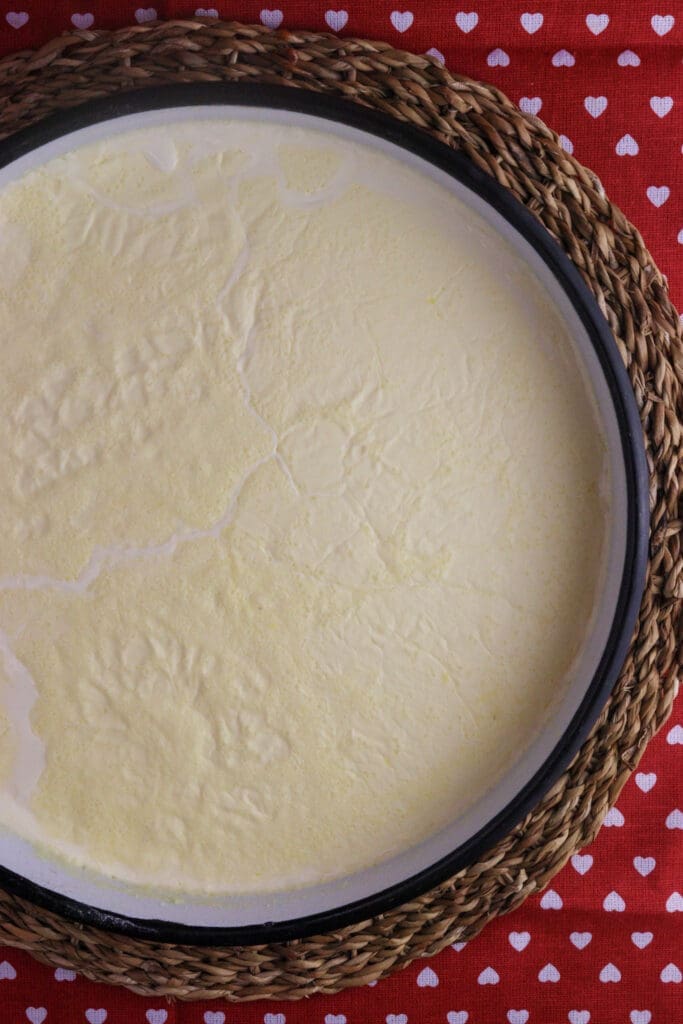 second kajmak layer formed on top of the milk