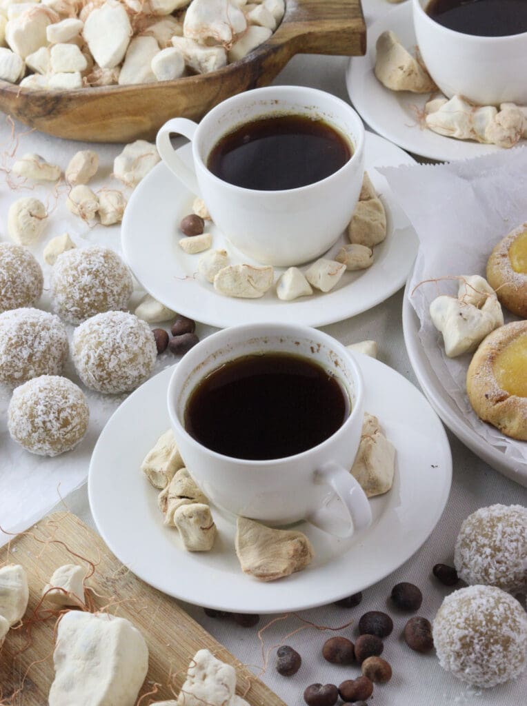 Baobab coffee served in cups together with baobab fruit pulp, baobab cookies and baobab balls. 