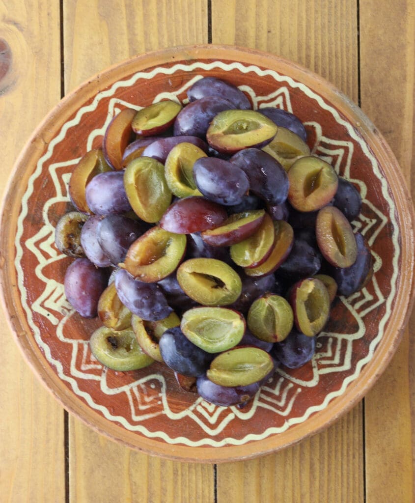 pitted plums before baking 