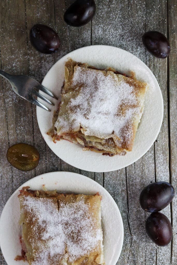 The best plum dessert with plums served on a plate. 