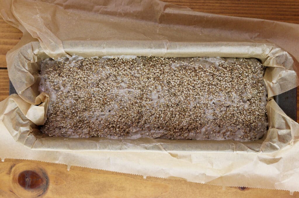 Buckwheat dough sprinkled with sesame seeds.