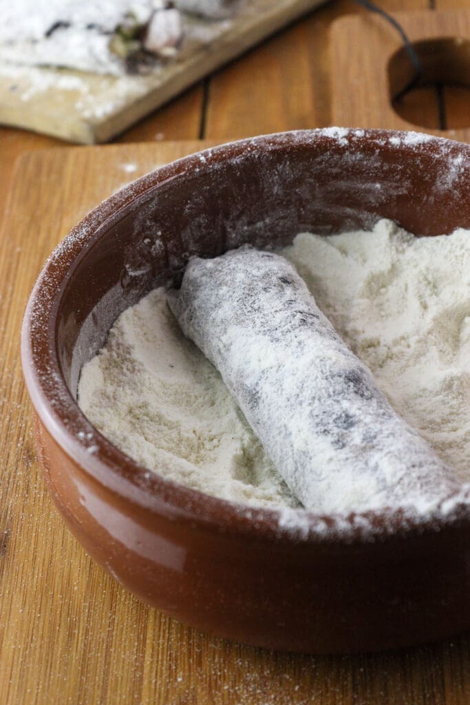 Dusting the rolls with flour first.