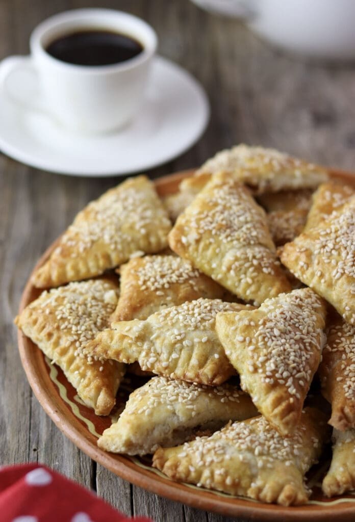 Cracling cookies served with a cup of Turkish black coffee.