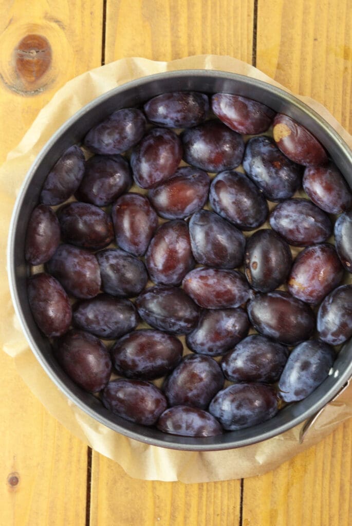 plum halves on the bottom of the baking pan, placed upside down