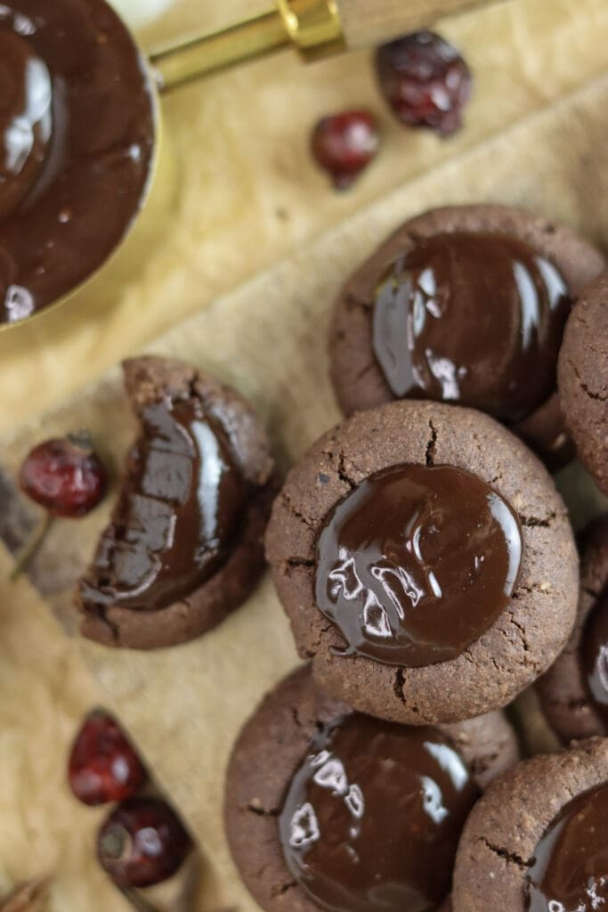 A bite of buckwheat chocolate cookies that looks too good and impossible to resist.