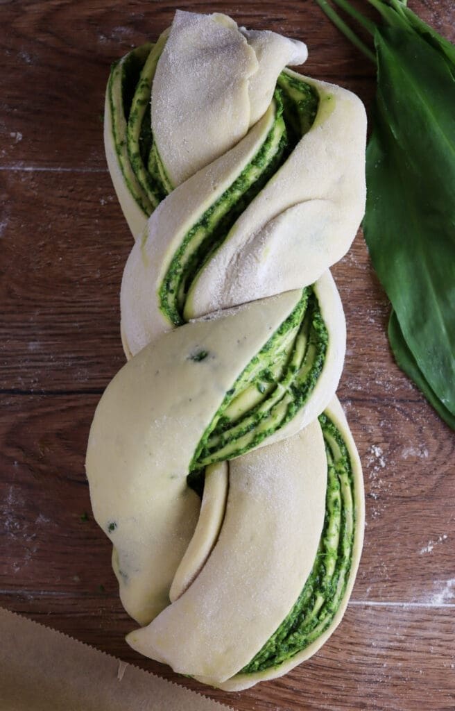 Wild garlic babka loaf before being transfered to a loaf baking pan.